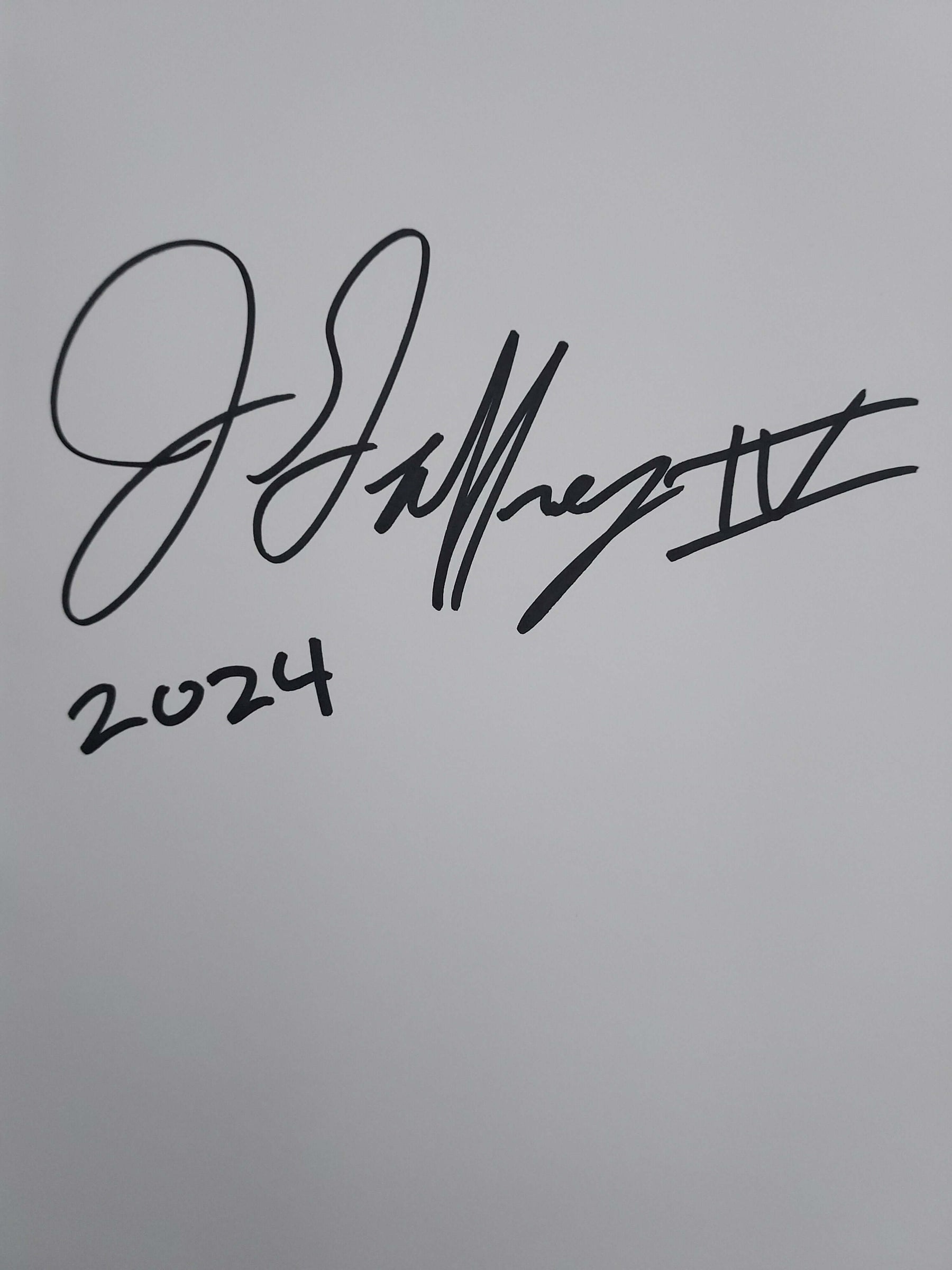 Signature of J. J. Merryman IV with the year 2024 on a blank page.